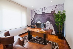 Refined-home-office-with-a-lively-backdrop-and-live-edge-workdesk