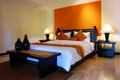 moderno-dormitorio-habitacion-cuarto-pintado-de-naranja-y-blanco11